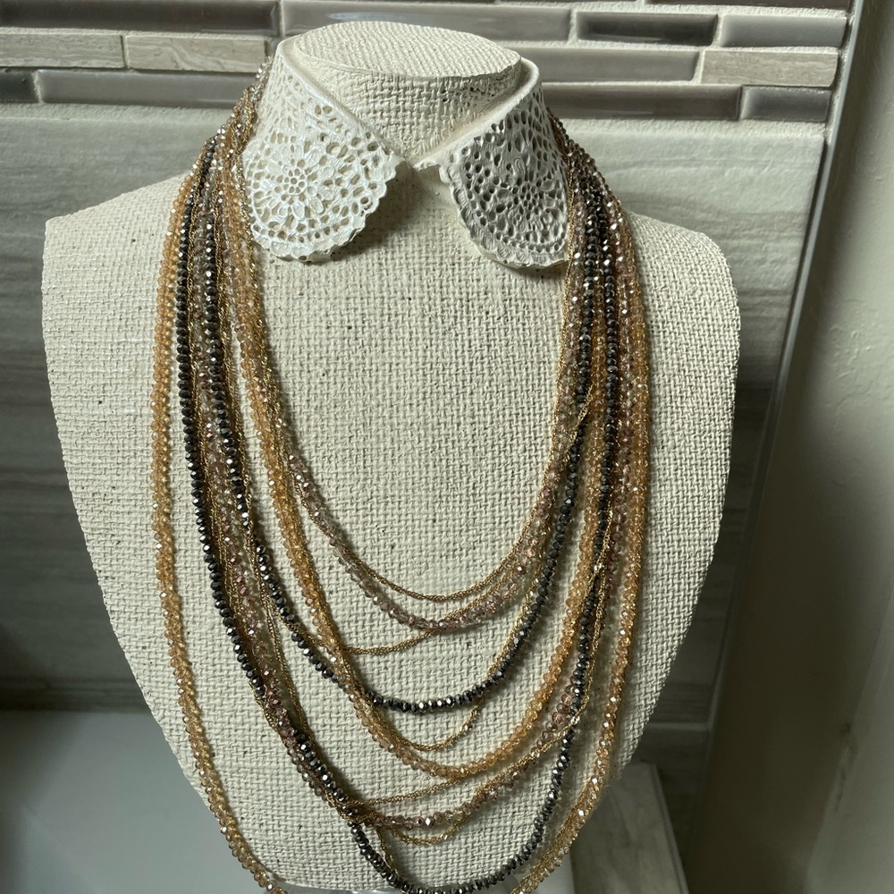 Multilayered mid length necklace